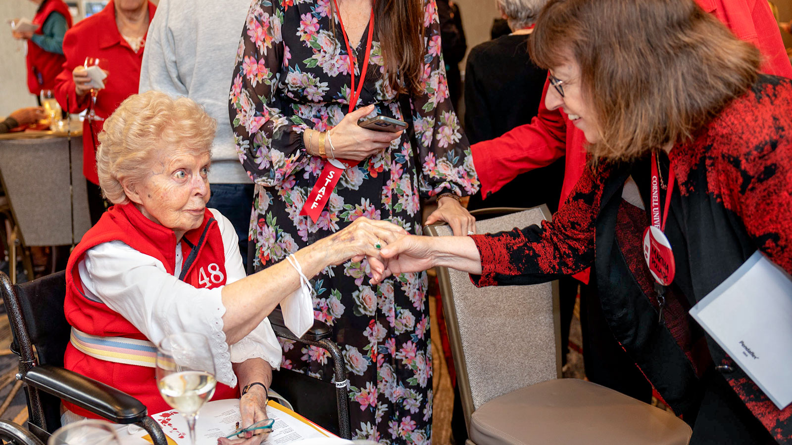 President Martha Pollack greets Martha Mapes, Class of 1948, during Reunion 2023 at the Statler Carrier Ballroom