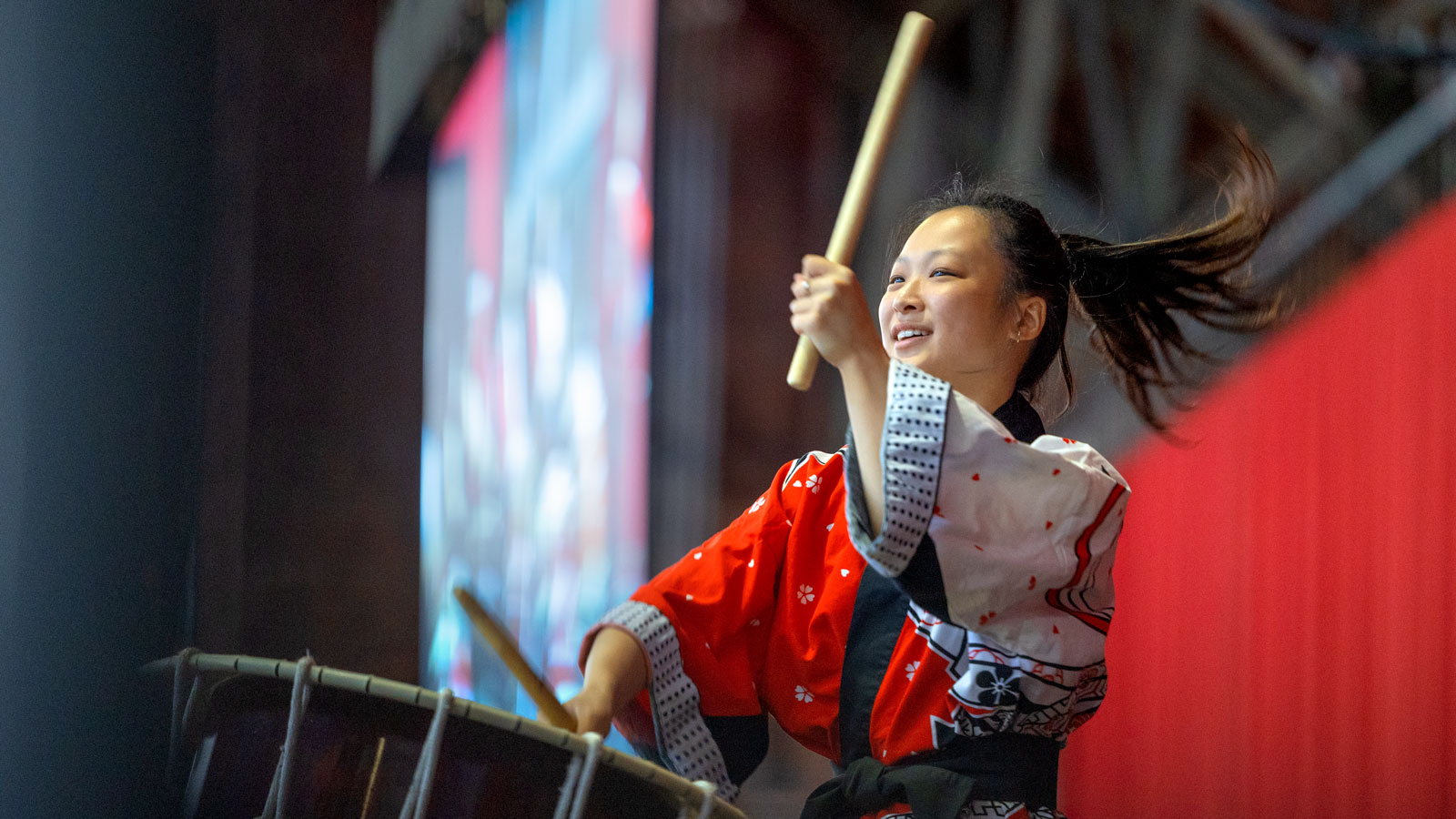 A student plays drums during Senior Convocation ceremonies in Barton Hall as part of Commencement 2024 events