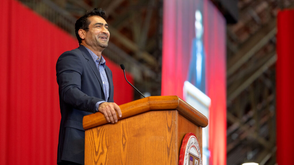 Comedian and actor Kumail Nanjiani addresses Cornell students at Senior Convocation in Barton Hall as part of Commencement 2024