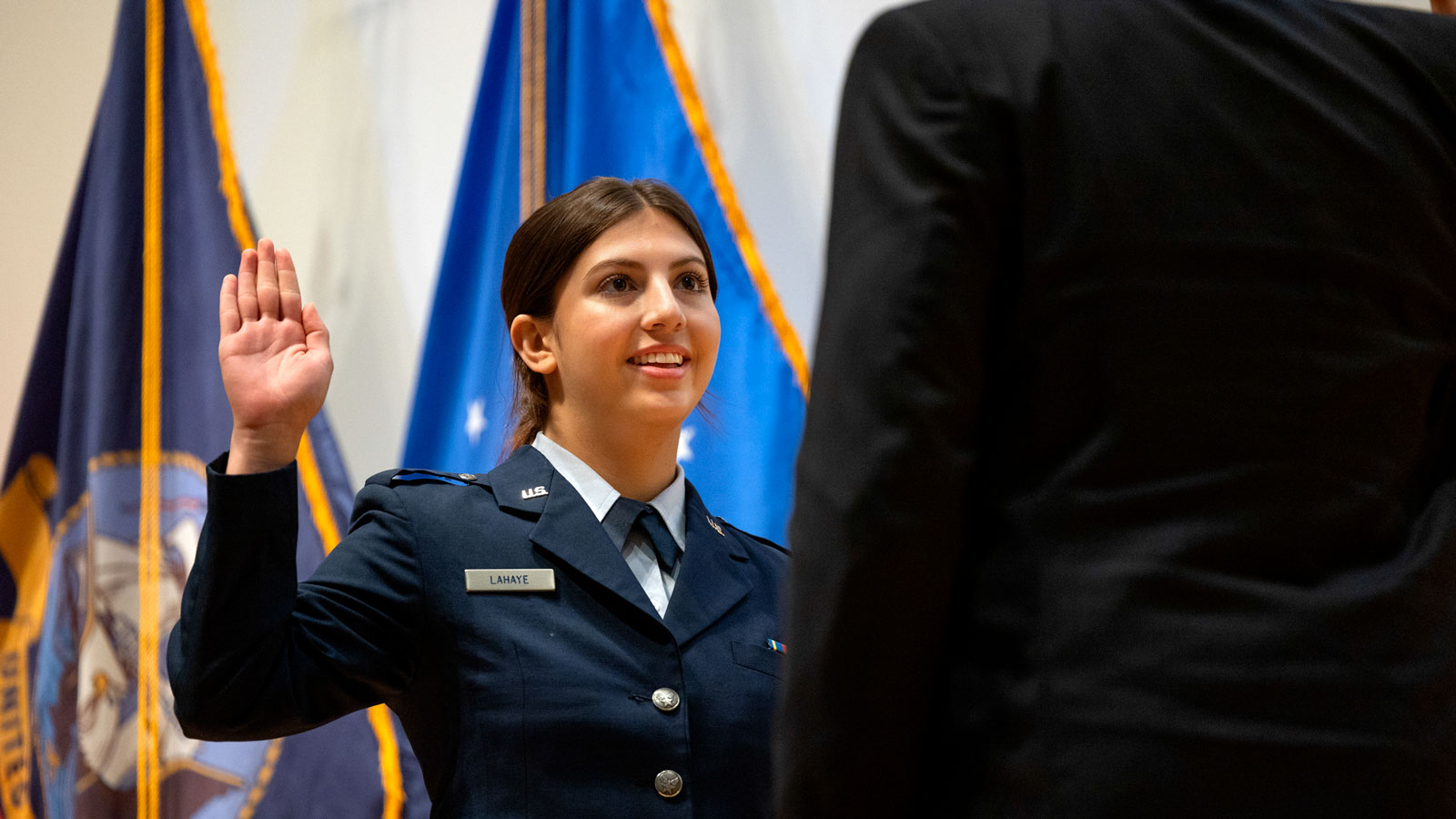 2nd Lt. Isabella LaHaye is sworn in during a commissioning ceremony at Statler Auditorium as part of Commencement 2024 events