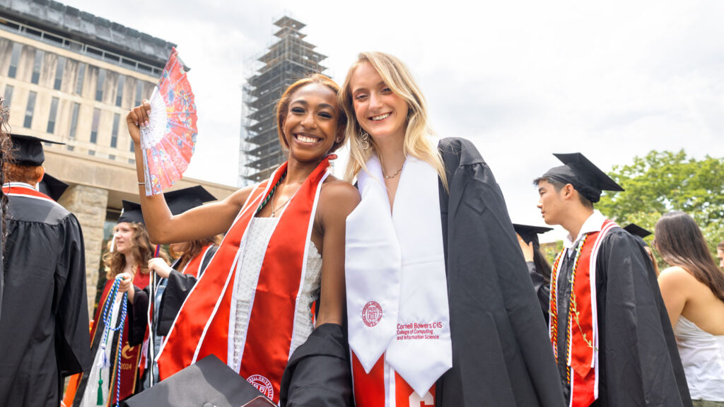Graduates pose on the Arts Quad prior to the academic procession as part of Commencement 2024 events
