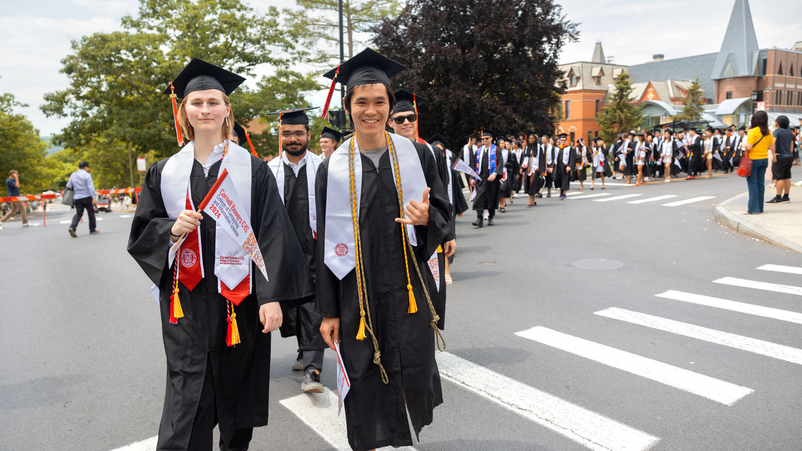 Graduating Cornellians walk in the academic procession during Commencement 2024 ceremonies