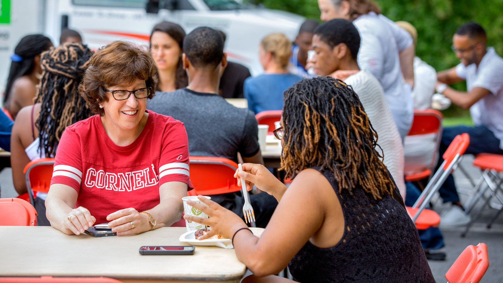 President Martha Pollack chats with students at the 2017 Africana Studies Welcome Barbecue in 2017