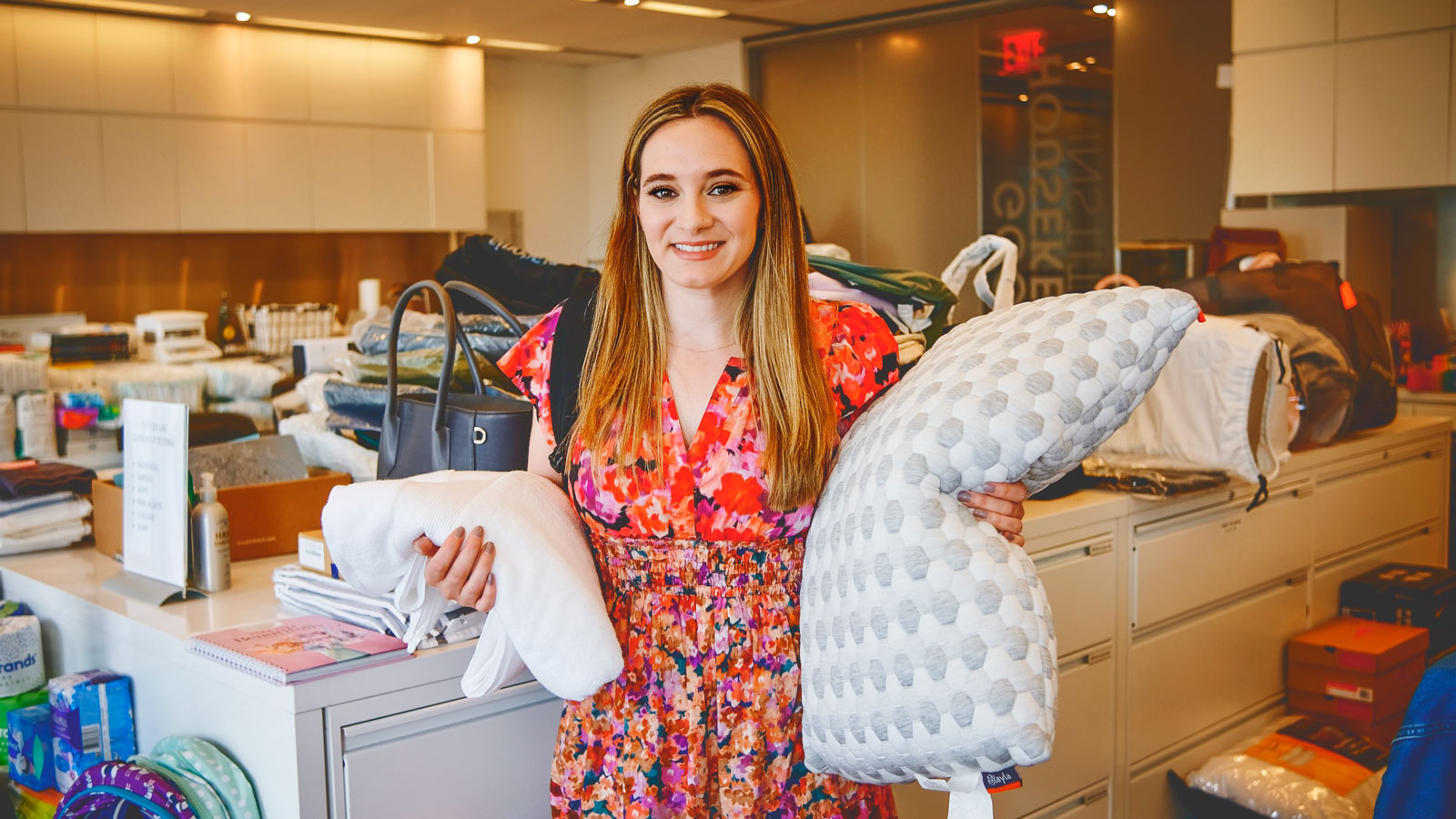 Leslie Sachs with sheets and a pillow at the Good Housekeeping Institute headquarters