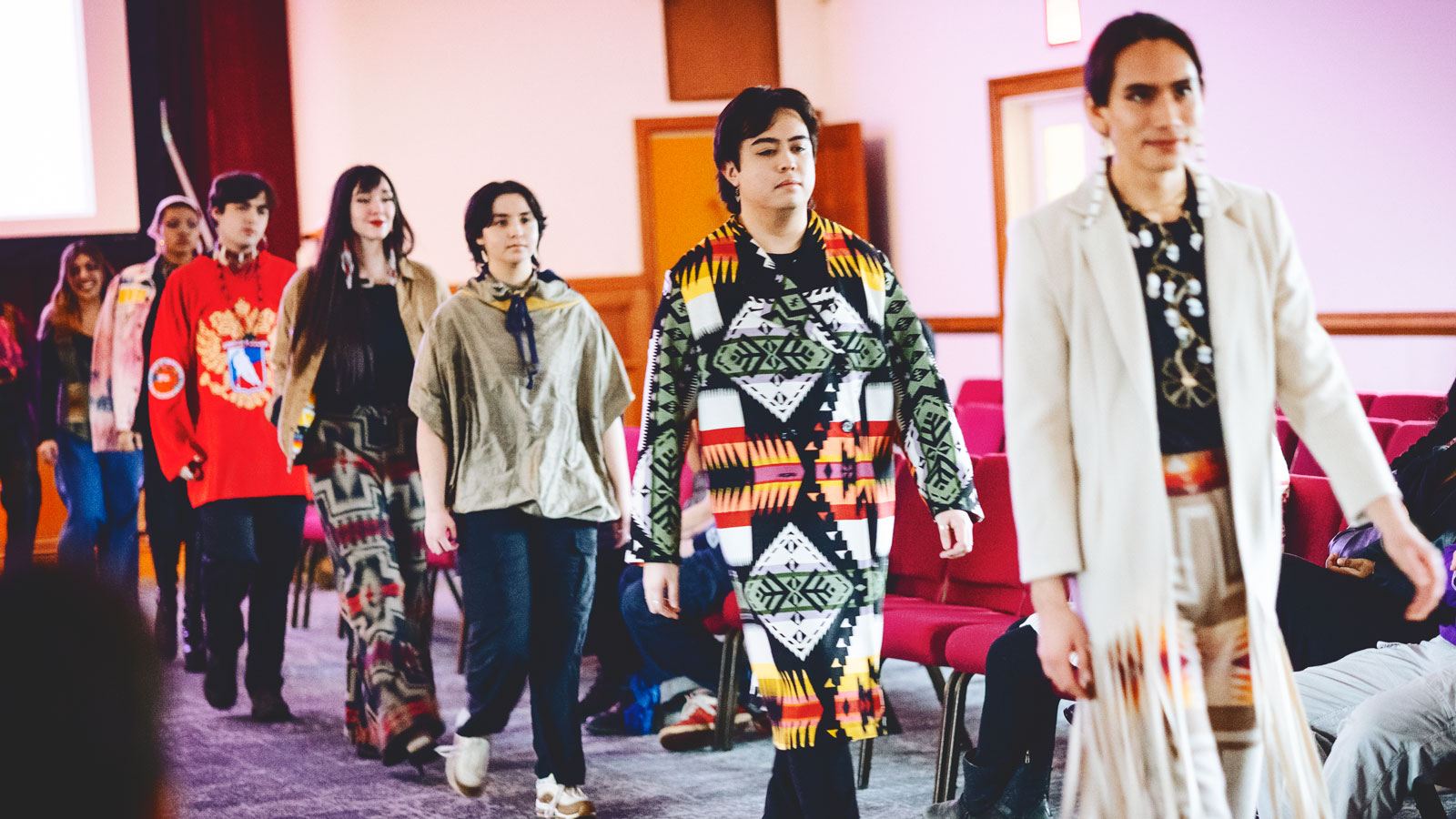 Native American students walk the runway at Rematriation: The Fashion Show at Cornell.