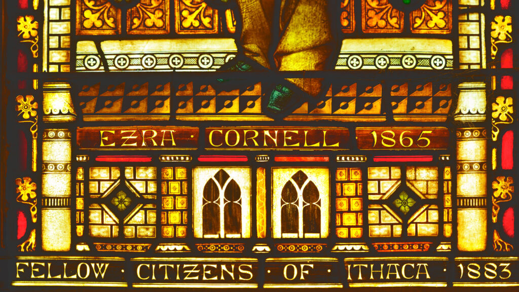 Detail view of the bottom of Ezra Cornell's stained-glass window in Sage Chapel