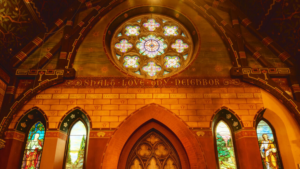 detail view of a wall of stained-glass windows in Sage Chapel