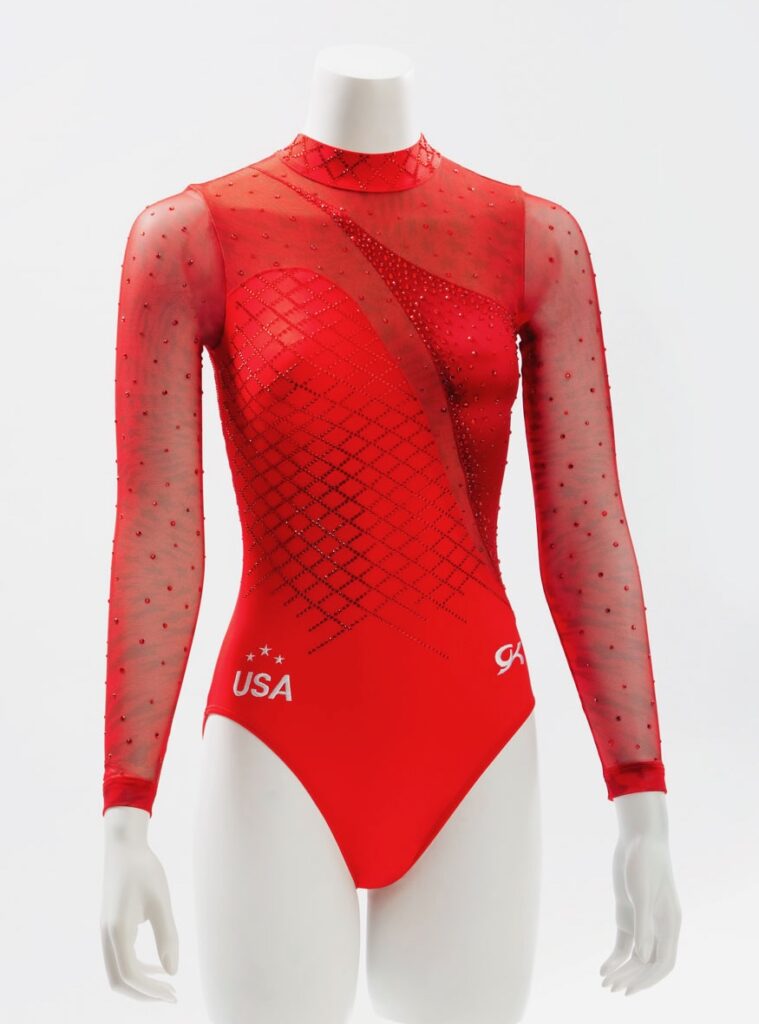 A red gymnastics uniform with crystal decoration