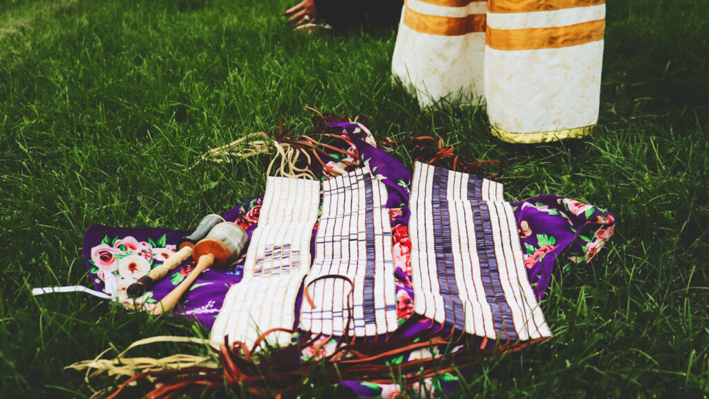 Wampum beads laying in the grass
