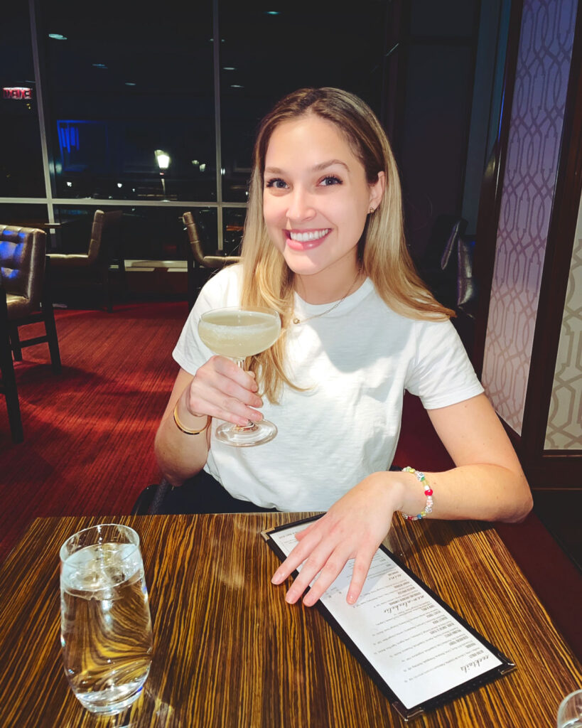 Nina Bachich in the Regent Lounge with her cocktail in spring 2024