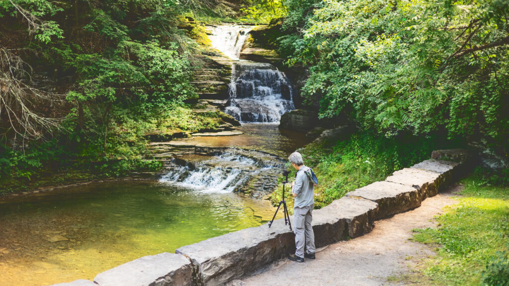 Daniel Ambrosi takes photos in Robert Treman State Park in Ithaca