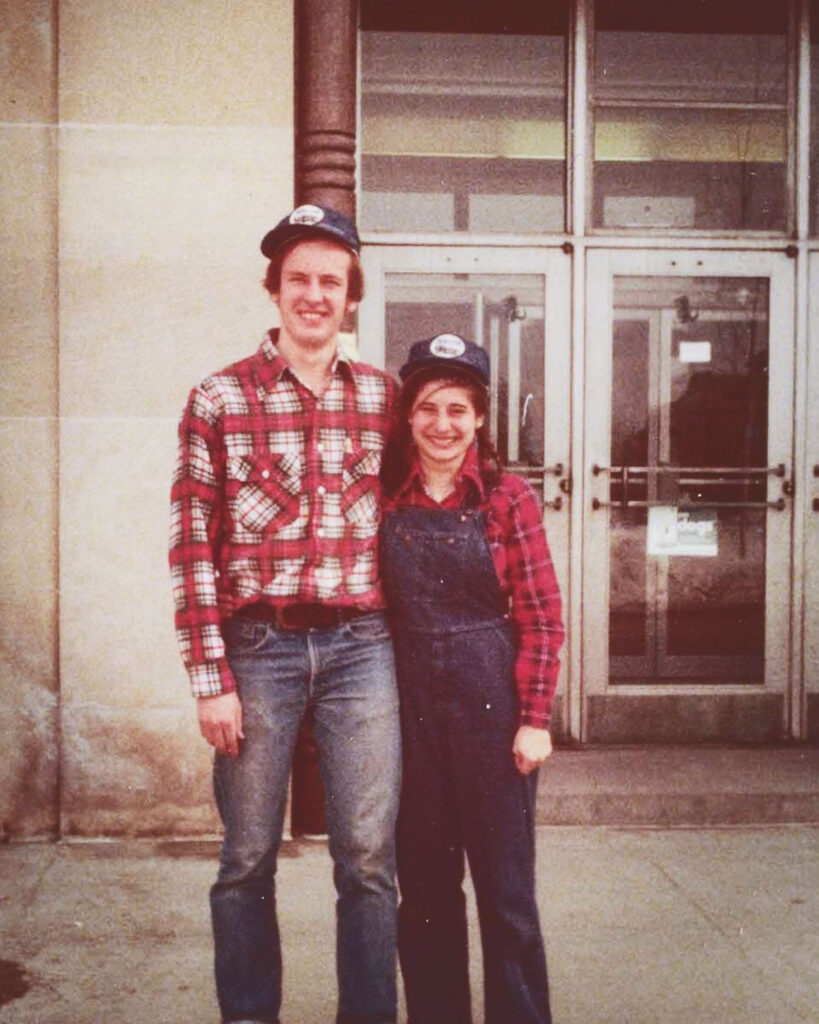 Margo Sue Bittner ’80, right, pictured with Jim Bittner ’80 in front of U-Hall 1 in 1977, where they met. They later married at Anabel Taylor Hall.