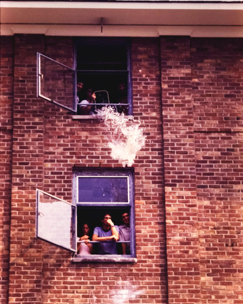 Water fight at a U-Hall, 1980