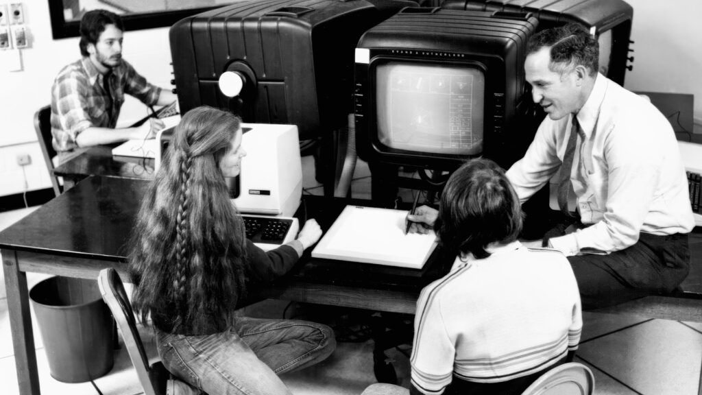 Daniel Ambrosi works with Professor Donald Greenberg and fellow graphics researchers at Cornell in 1981