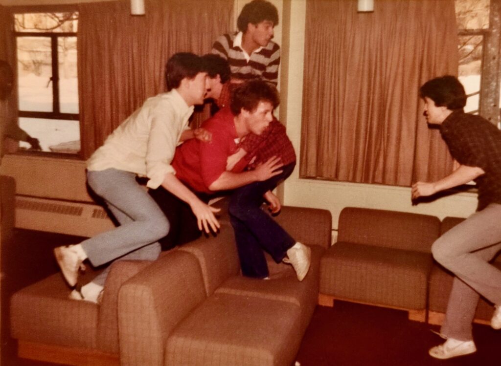 Residents play Super Bowl lounge football in a U-Hall common area, 1984