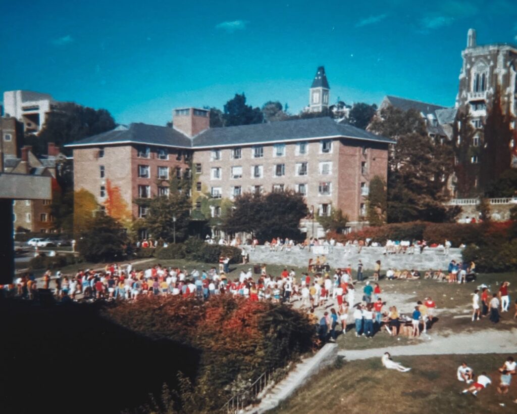 A crowd turns out for the Kappa Alpha Theta / Sigma Alpha Epsilon Tug of War event for Easter Seals in the fall of 1984