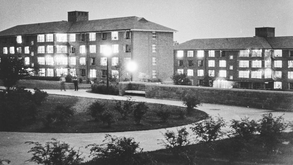 Night view of two of the University Halls