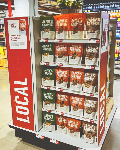 A display of Jamie's Farm products in Whole Foods