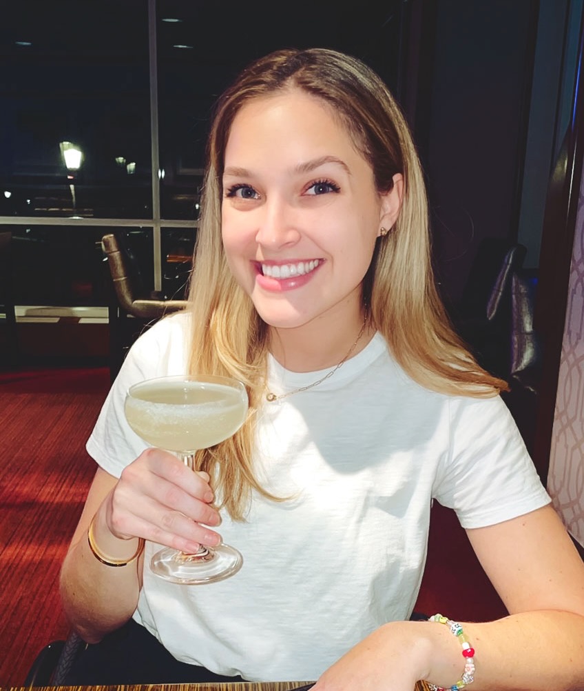 Nina Bachich holding a cocktail