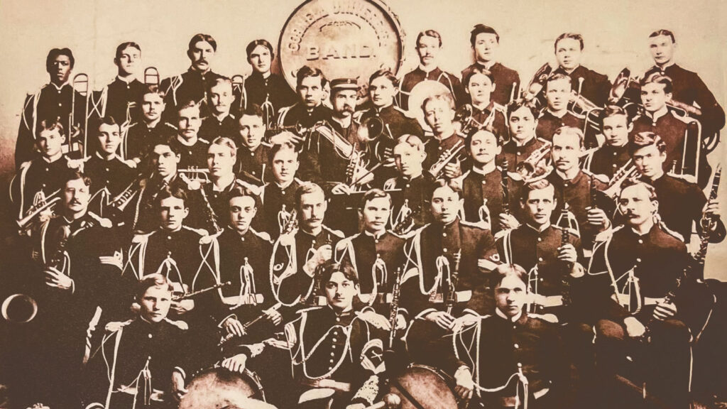 a group photo of marching band members in 1895
