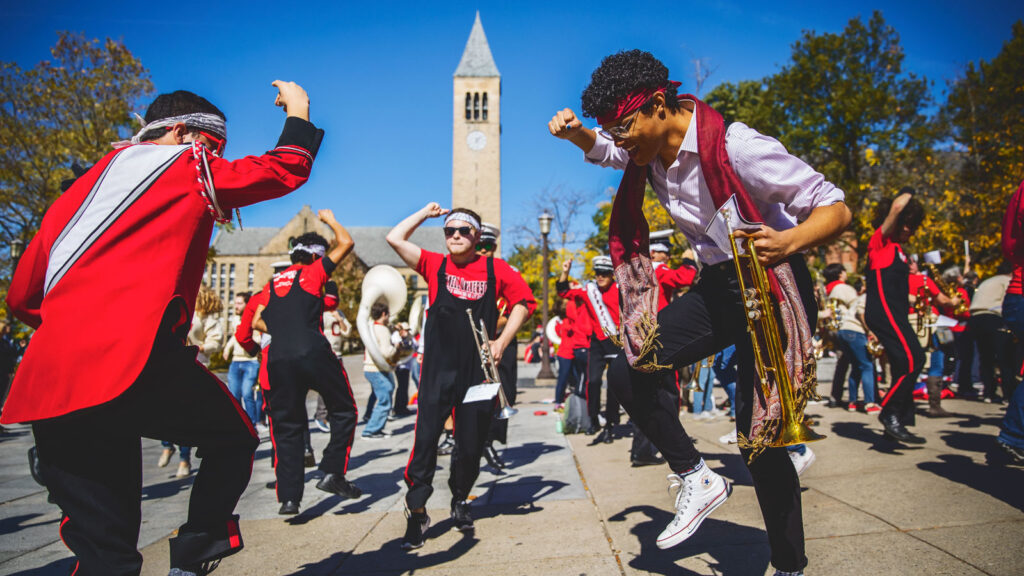 members of the Big Red Marching Band’s horn section on Ho Plaza during Homecoming 2019