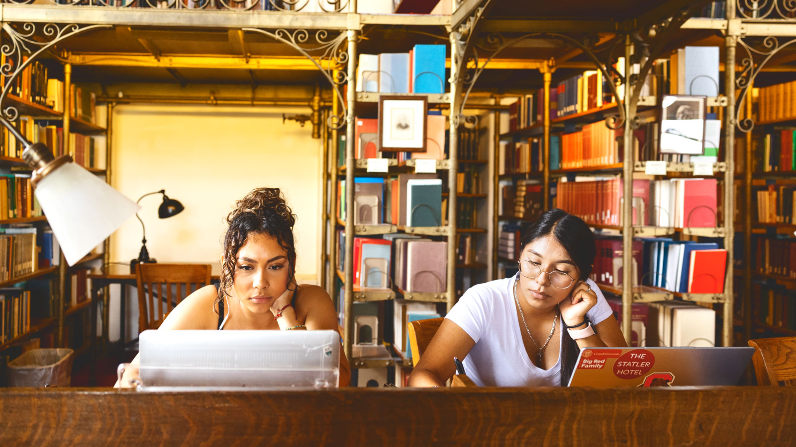 students study in the A.D. White Reading Room in Uris Library