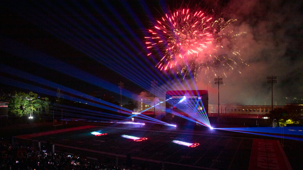 view of the fireworks display and laser light show at Schoellkopf Field for Homecoming 2024