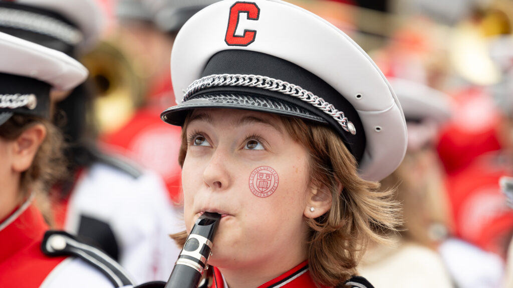 a clarinetist in the Big Red Marching Band plays during Homecoming 2024