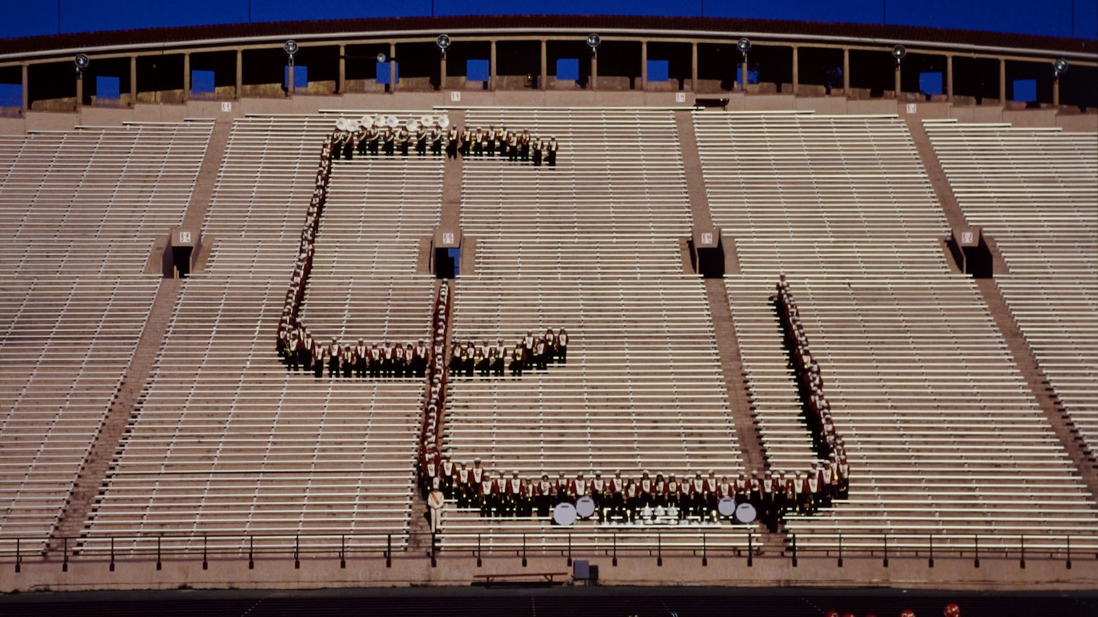 Members of the Big Red Band form a "CU" on the Schoellkopf Stadium seats for a photo in 1998