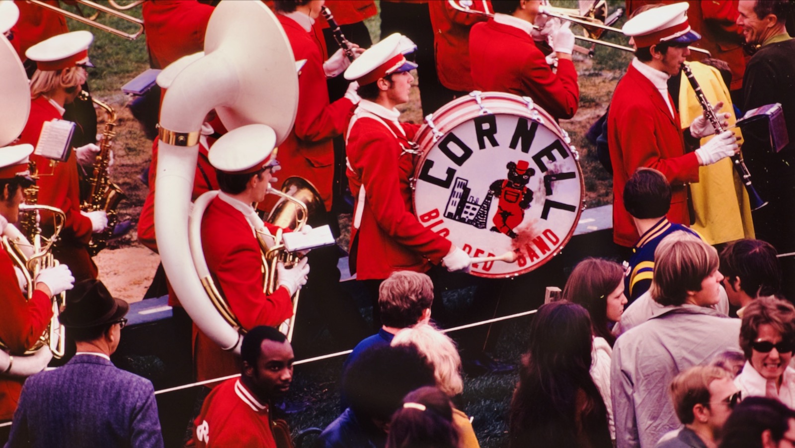 a section of the band, complete with a drum with the band logo, during a performance in 1970