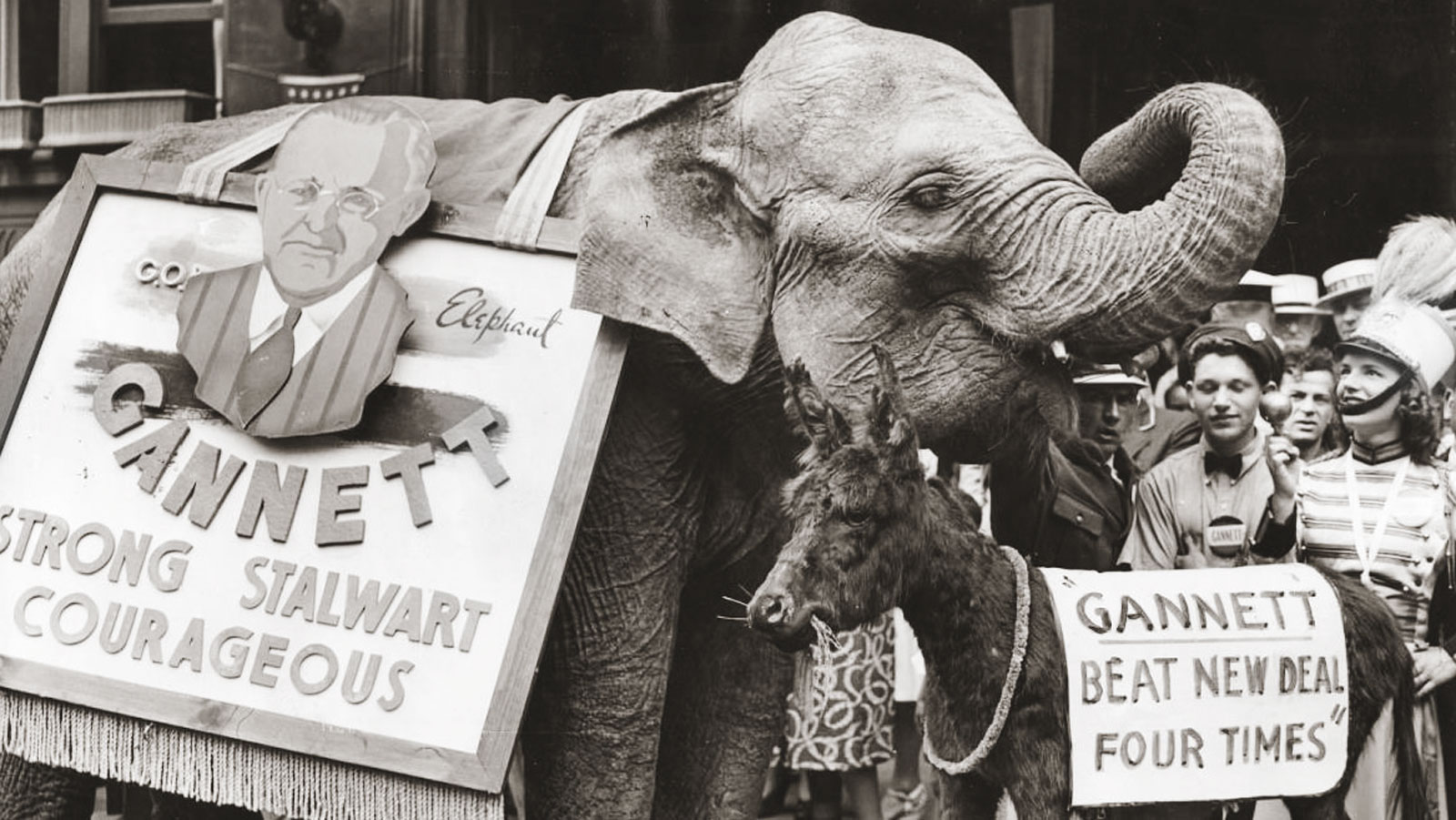 An elephant bearing the slogan, 'Gannett, strong, stalwart, courageous'