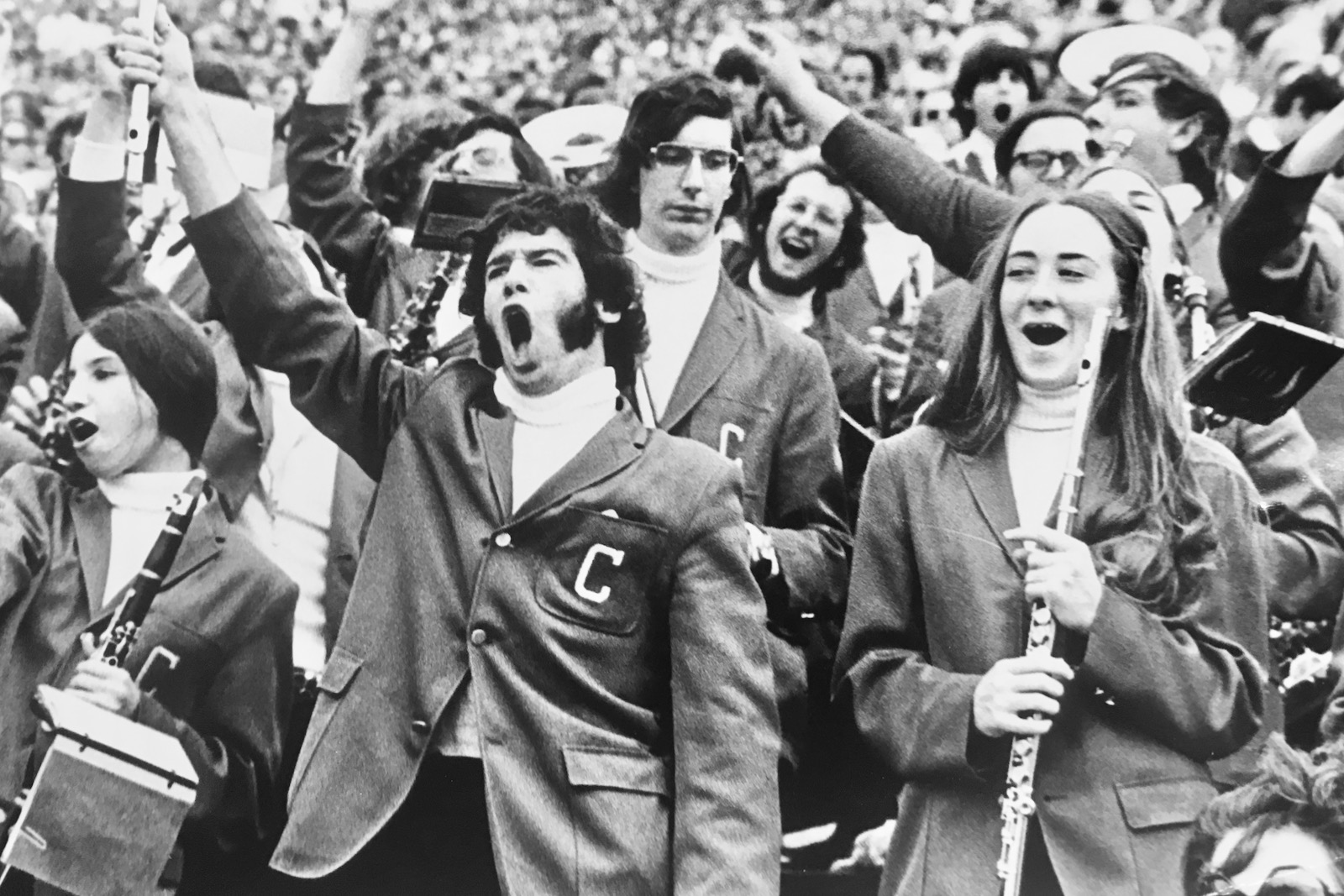 band members cheer in the early 1970s