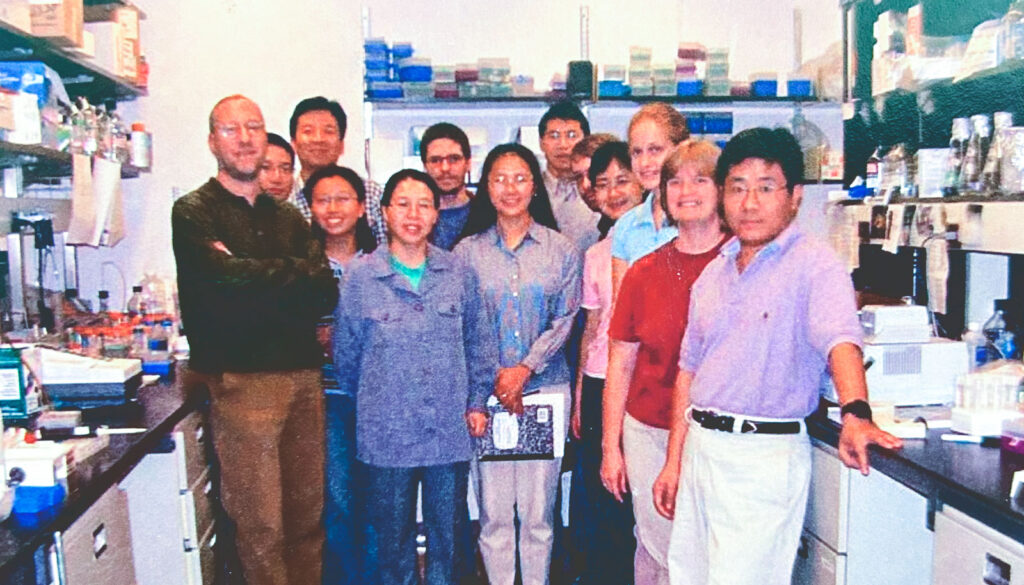 Mike Kotlikoff with his lab group at the College of Veterinary Medicine in an image from the early 2000s