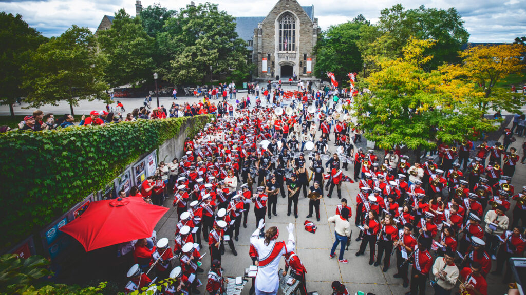 The band plays on Ho Plaza in front of the Cornell Store during Homecoming Weekend 2018