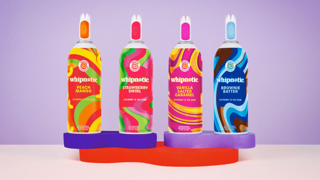 Four colorful cans of Whipnotic flavored whipped cream