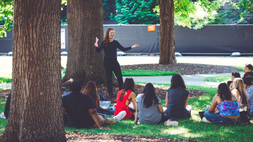 A professor holds class outdoors on the first day of classes of the 2024 fall semester.