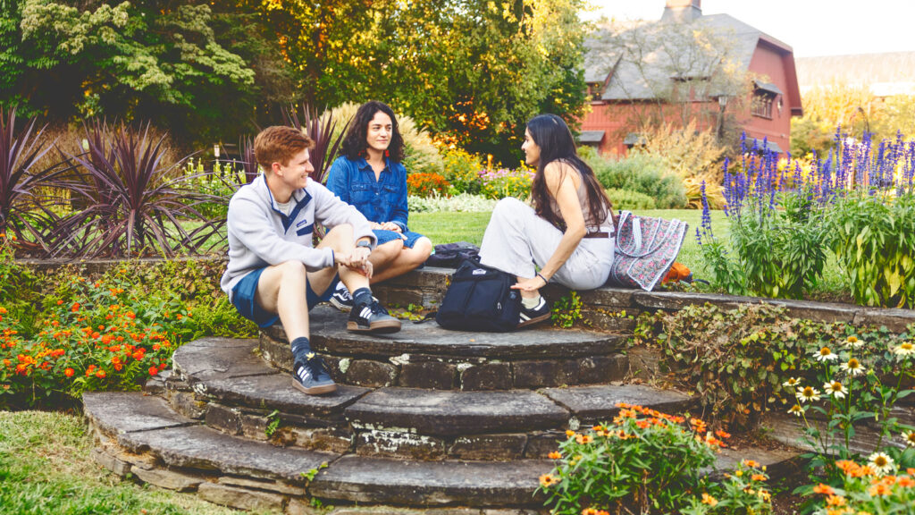 Students relax by A.D. White House.