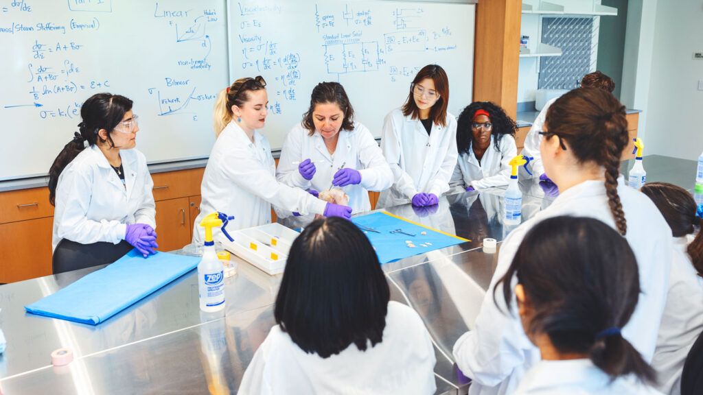 The new Martin Y. and Margaret Lee Tang Hall: Students gather for a demonstration in a class in 391 Tang Hall.