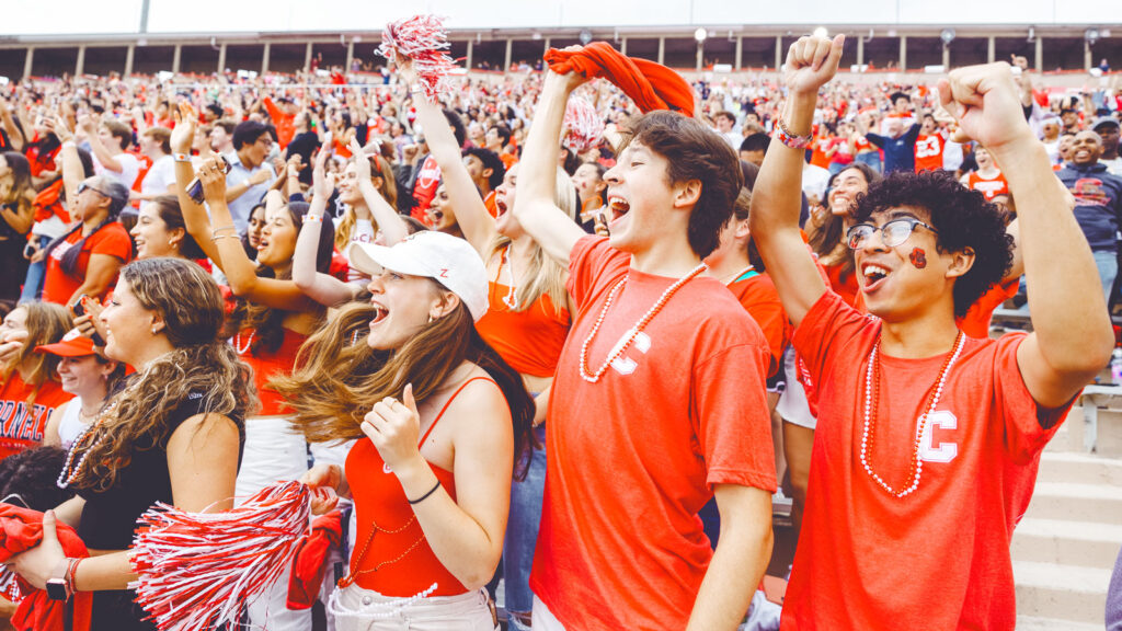 The crowd cheers on Cornell Football during Homecoming weekend 2024 at Schoellkopf Field.