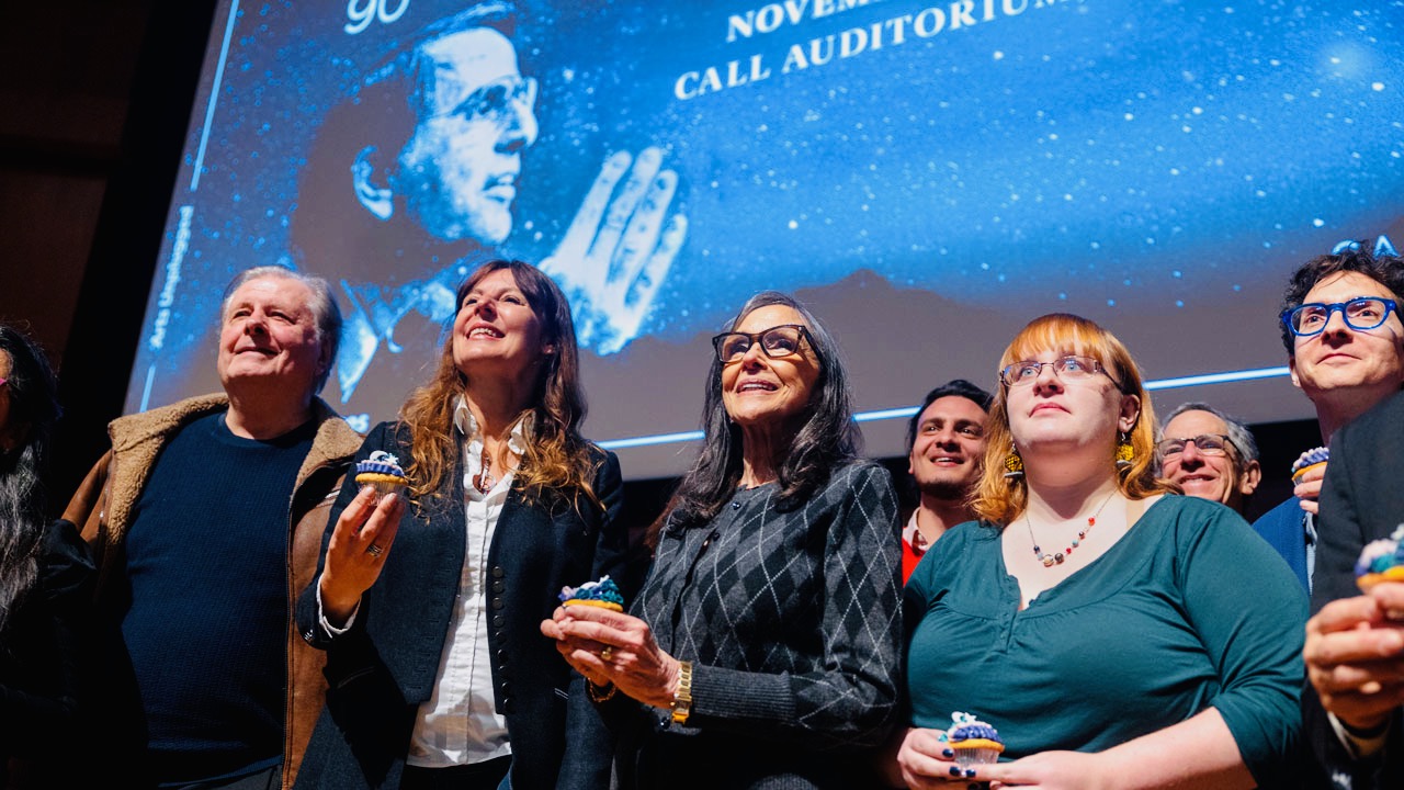 Presenters and attendees enjoyed “planetary cupcakes” during a break in “Carl Sagan’s 90th Birthday: A Celebration” on Nov. 9 in Call Auditorium. At center, Ann Druyan, Sagan’s widow, stands next to Carl Sagan Institute Director Lisa Kaltenegger, second from left.