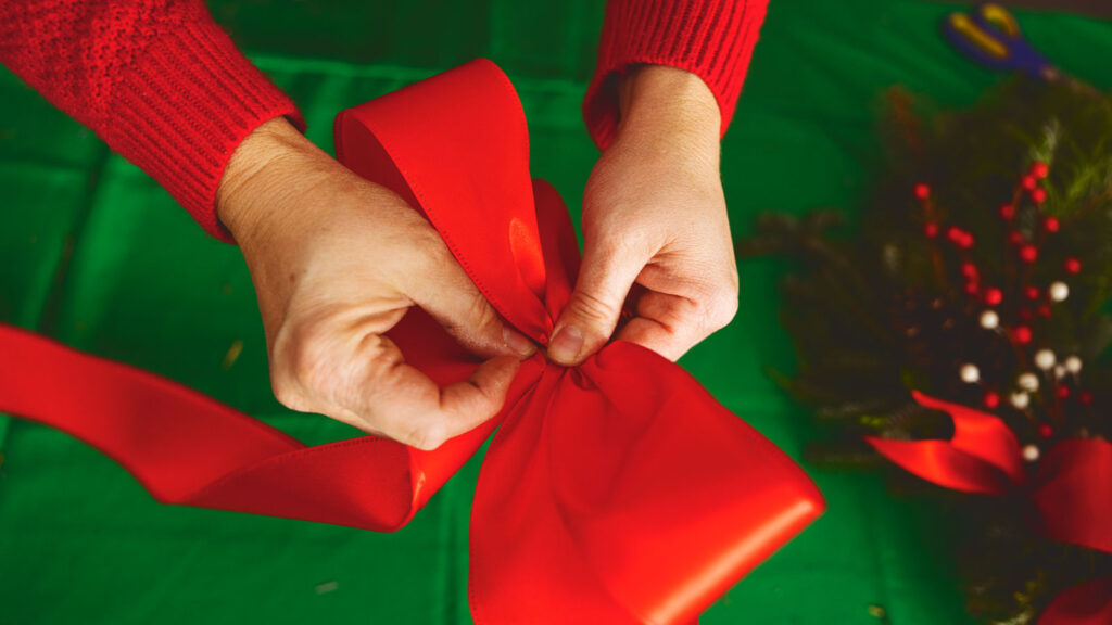 A big red bow during the assembly process.