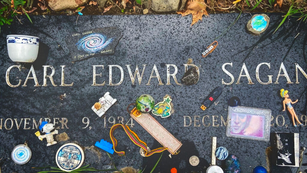 The grave of Carl Sagan with numerous objects on it