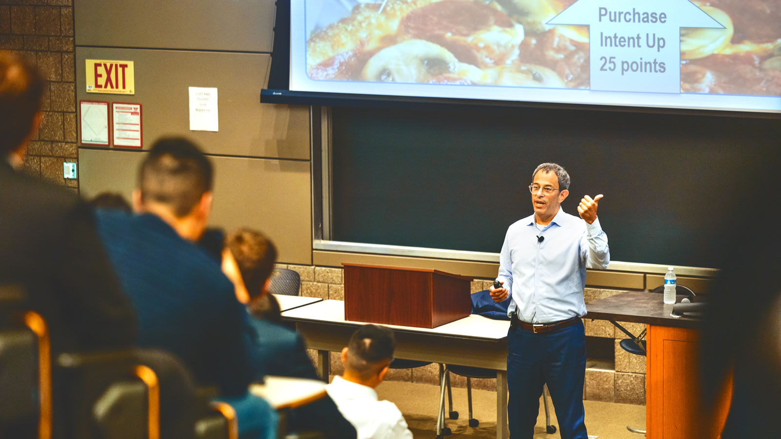 Domino's CEO Russell Weiner '90 spoke at a marketing class for graduate students in the business school, September 2024. Ives Hall, Pepsi Co. Auditorium.