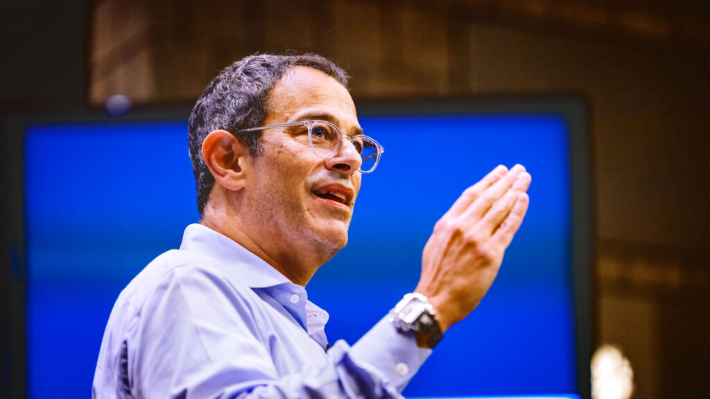 Domino's CEO Russell Weiner '90 spoke at a marketing class for graduate students in the business school, September 2024. Ives Hall, Pepsi Co. Auditorium.