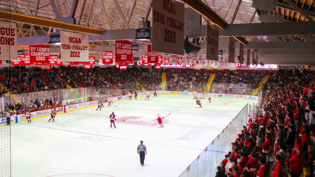 banners marking the dates of winning hockey championship seasons hang in the rafters at Lynah Rink