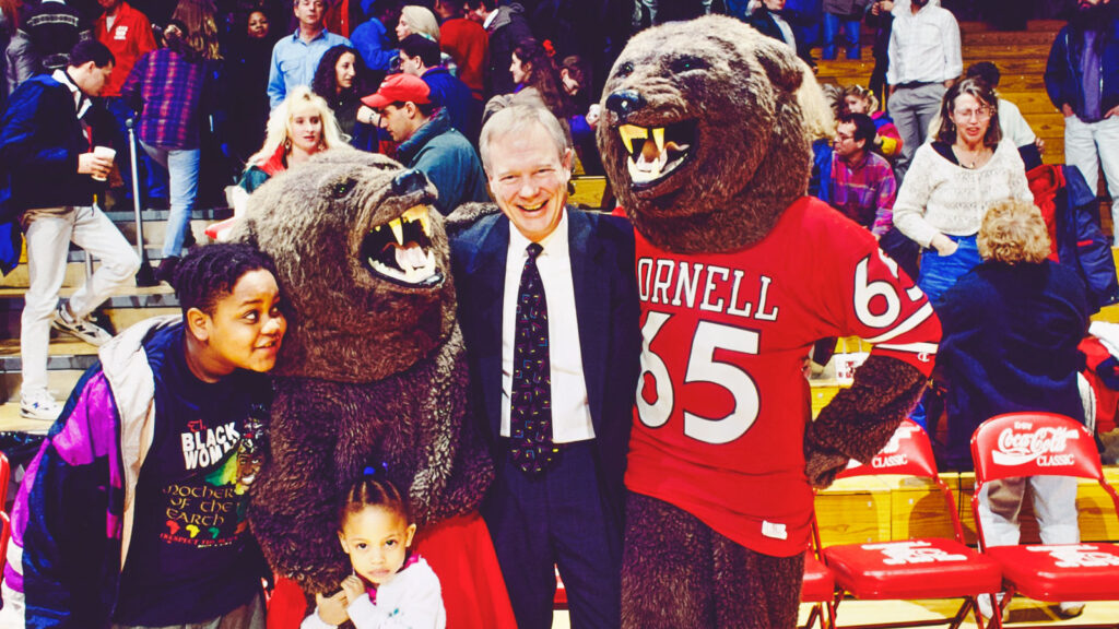 The Big Red Bears couple hangs out at Newman Arena with fans