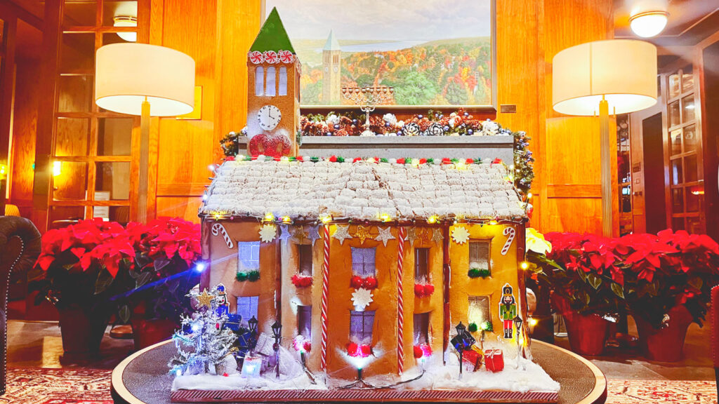 A view of the gingerbread McGraw Tower and Uris Library that the Cornell Club-NYC displays in the lobby each holiday season