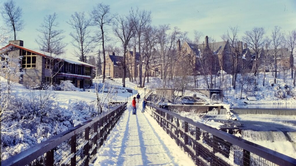 the bridge over Beebe Lake toward North Campus is visible in the snow in 1977