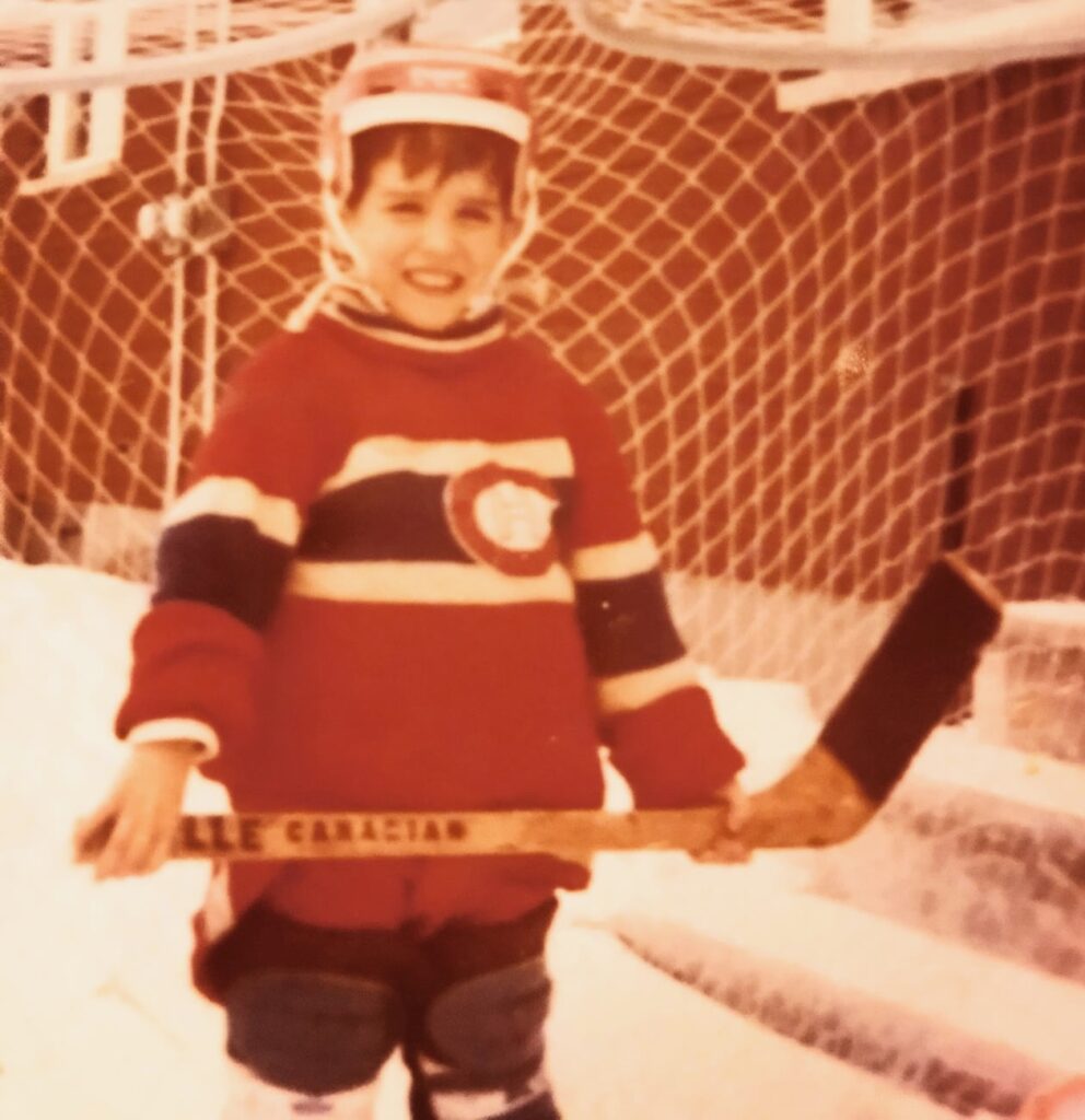 A young Casey Jones dressed for hockey