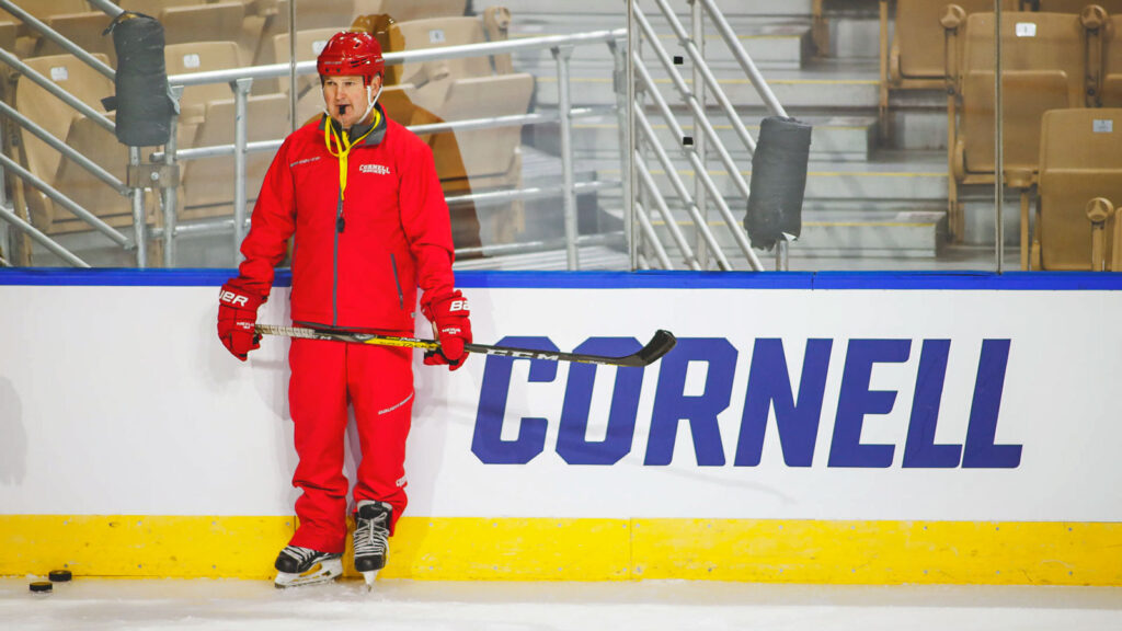 Schafer coaching on the ice